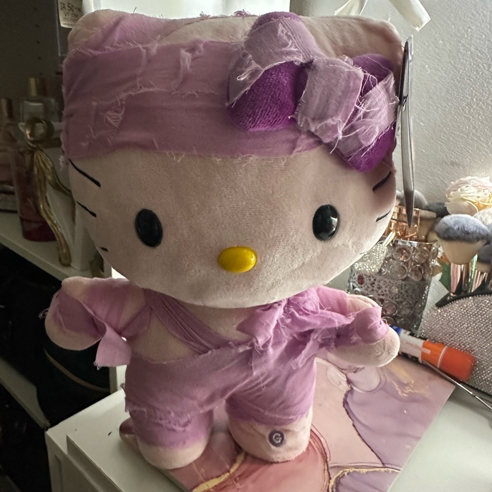 Pink Hello Kitty mummy side stepper.